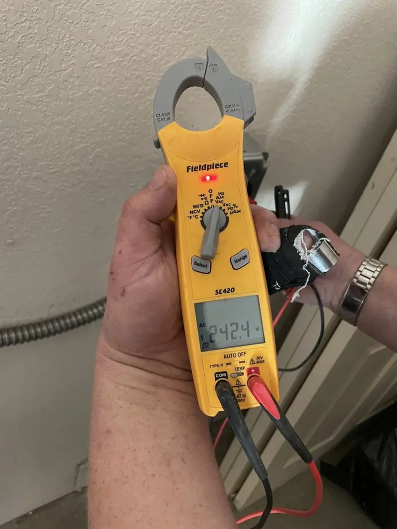 Voltage testing with clamp meter during Generator Installation in South Miami